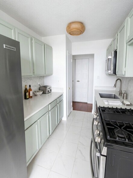 Kitchen Looking in to Front Hallway - 501 Slaters Ln