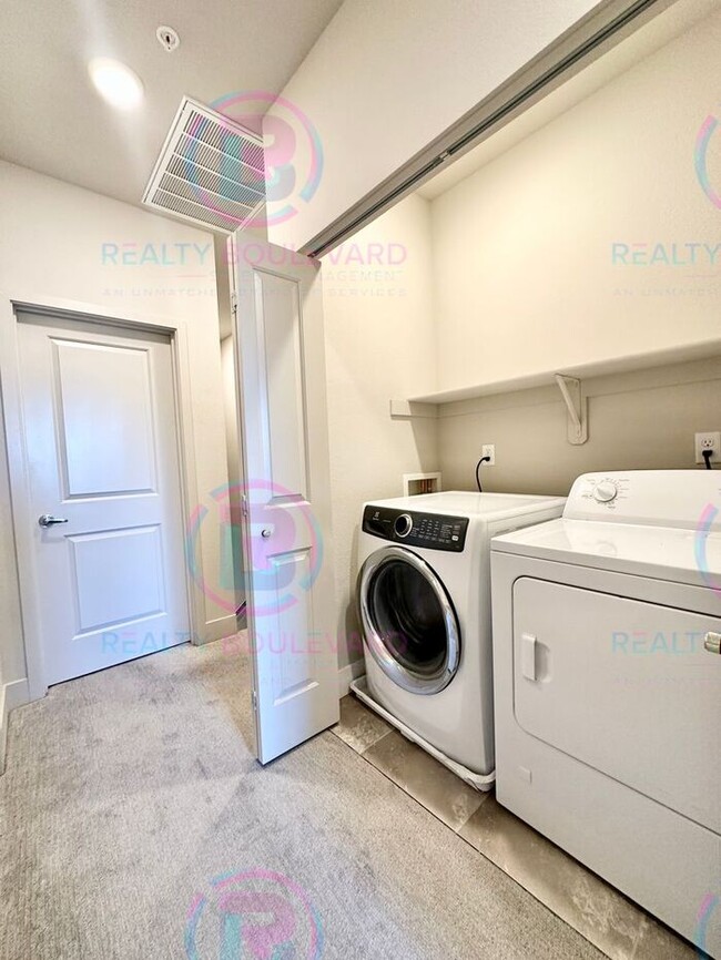 Building Photo - 1 Month Fee!-Specific. Modern Designer 2 Bedroom 2.5 Bathroom Townhome with Smart Features, Tesla...