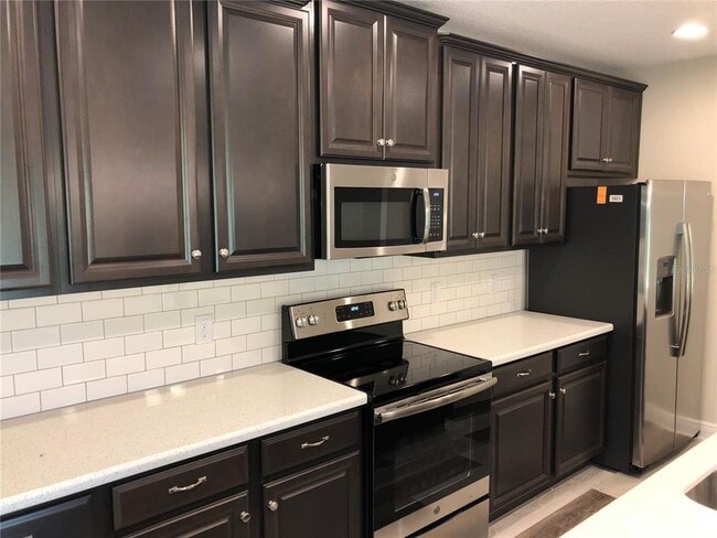 Building Photo - 5512 Windsong Oak Dr