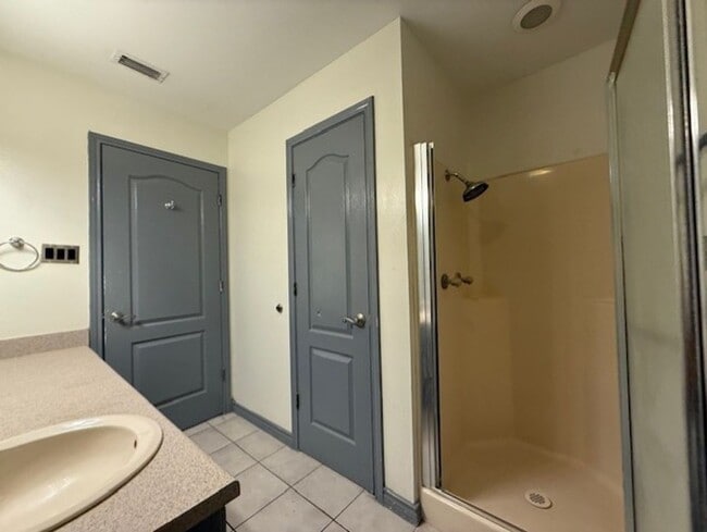 Building Photo - Downstairs -Three-bedroom Condo