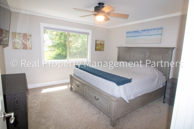 Building Photo - Spacious 3BR Townhome in Lowell | Nature Views & Maintenance-Free Living