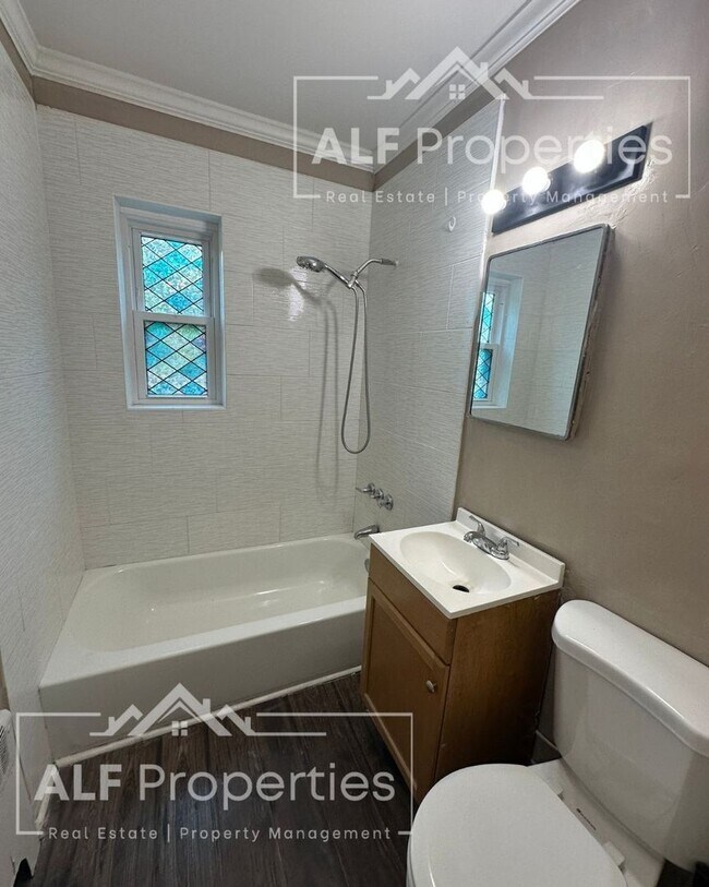 Building Photo - Renovated 2 Bedroom, 1 Bath First-Floor Apartment Available