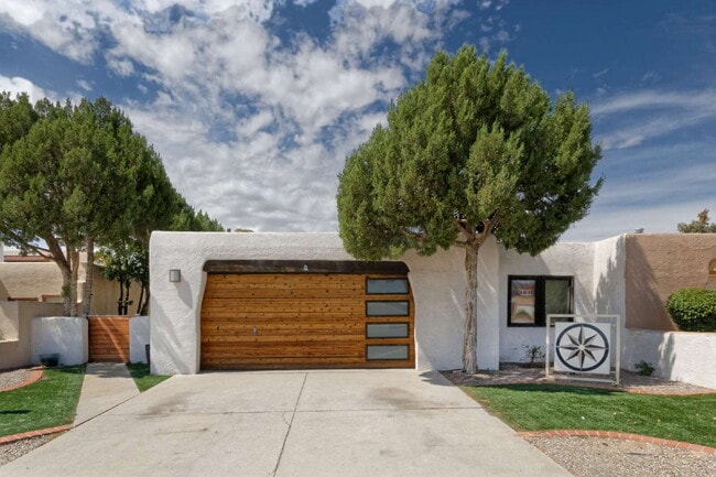 Primary Photo - One-of-a-kind adobe brick home backing up ...