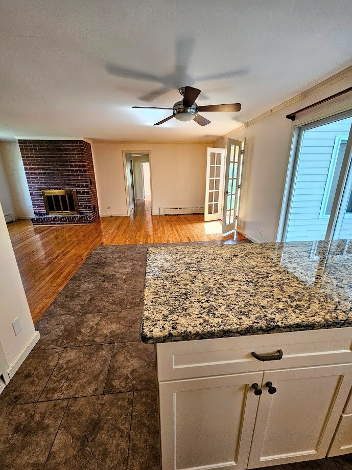 Open floorplan. View from kitchen to dining area and living room - 30 Fairfield Ave