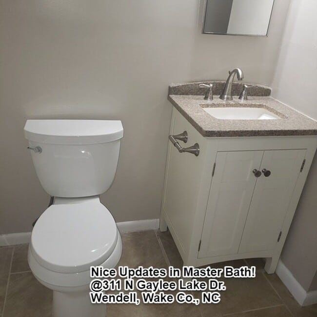 Building Photo - $1795/mo. w/Modern Renovations! 4 BR, 2 BA Wendell, NC!  Large, Split-Level single family home w/...