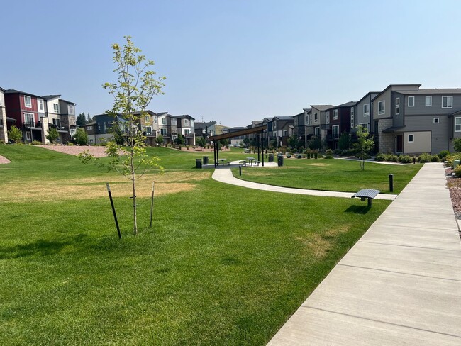 Building Photo - Impressive 4 Bedroom Townhome Nestled in M...