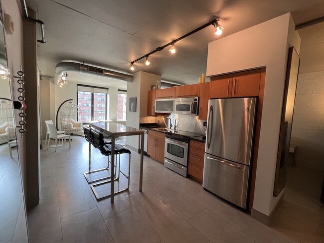 Kitchen with custom-made Bar Table and Restoration hardware chairs - 1133 14th St NW