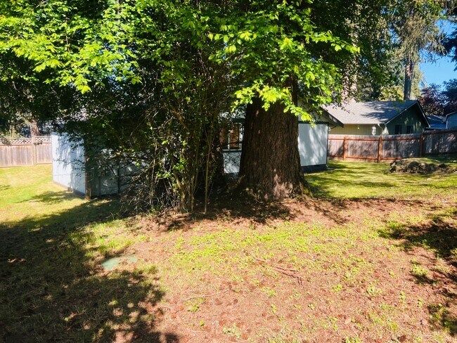 Building Photo - Charming 3BR/1BA w/ 1-car garage, long driveway, fenced yard, wood stove & shed/workshop.