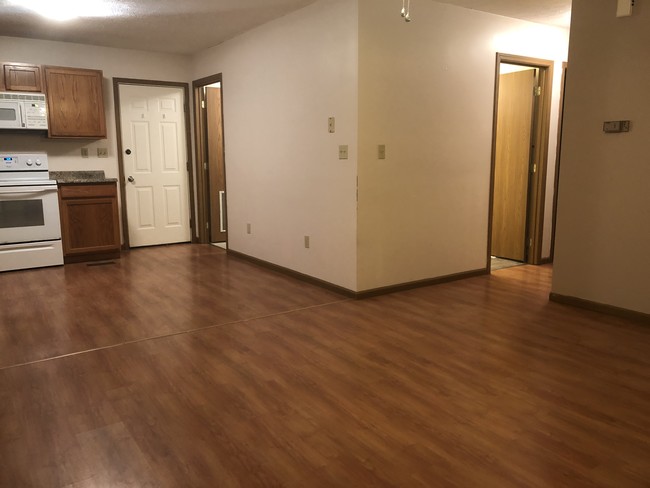 This unit has laminate flooring - 109 N Plains Rd