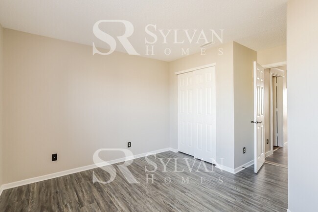 Building Photo - This lovely 4BR, 2.5BA home is move-in ready