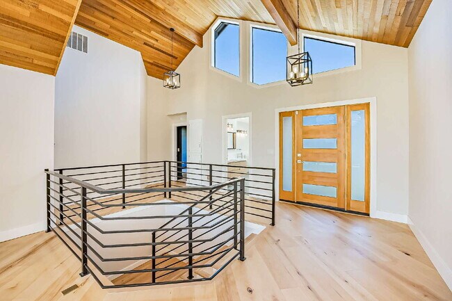 Building Photo - Sophisticated and Elegant home is located in Harbor Ridge at Browns Point. Spacious 4 bedroom, 4 ...