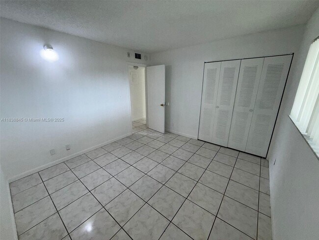 Building Photo - 8560 N Sherman Cir