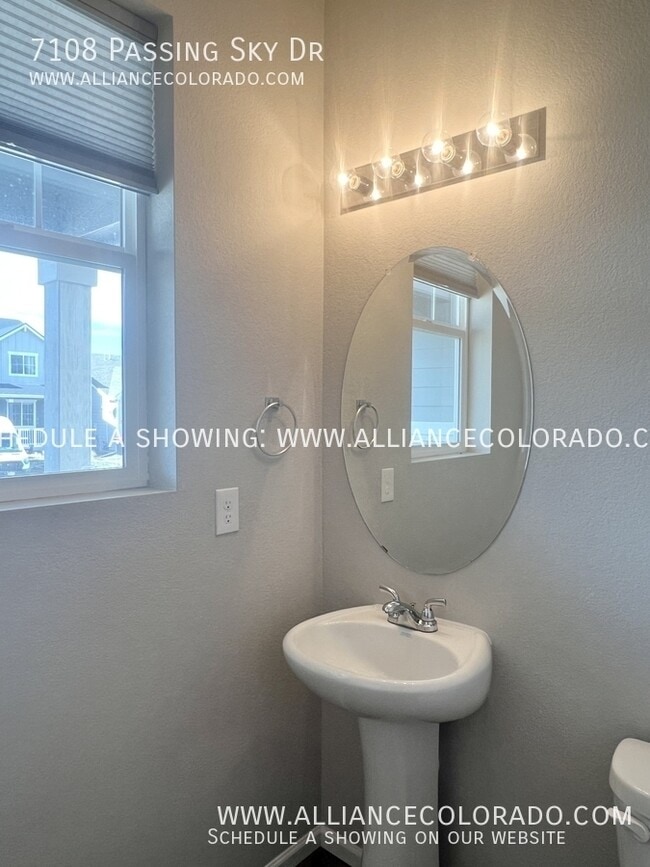 Building Photo - 7108 Passing Sky Dr