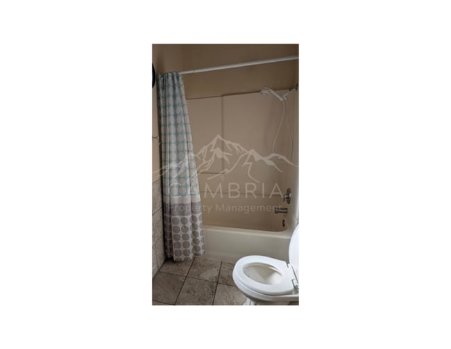 Building Photo - Charming 4-BR Home in Midvale