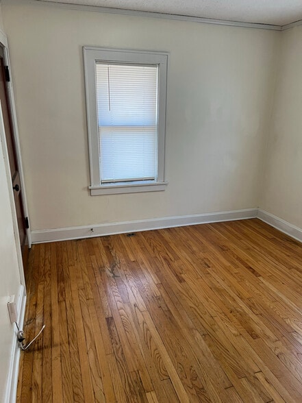 Building Photo - 8512 Woodland Ave