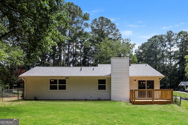 Building Photo - 9073 Woodgreen Way