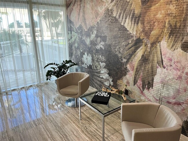 Building Photo - 10275 Collins Ave