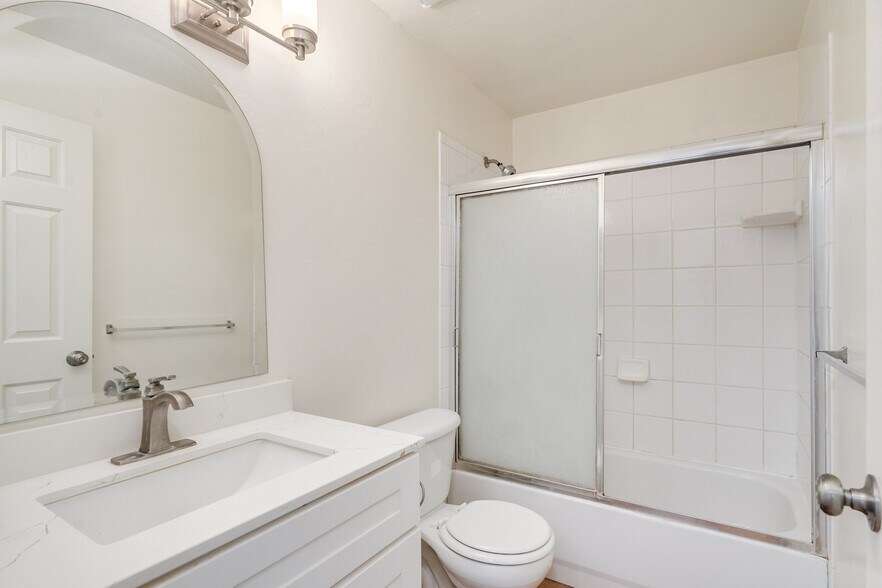 Bathroom 2 with updated vanity and quartz countertops - 3138 E Adams St