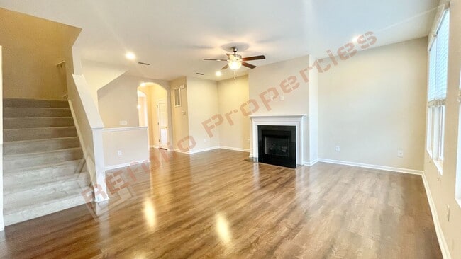 Building Photo - 3 Story Townhome 3 Bedrooms Rear Entry 2 Car Attached Garage with 1st Floor Bedroom, Community Po...