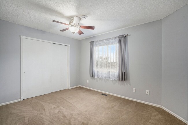 Building Photo - Spacious 4-Bedroom Home in District 20 with Huge Deck & Fenced Yard