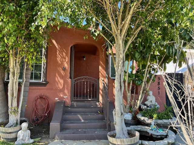 Front door and porch of home - 5851 7th Ave