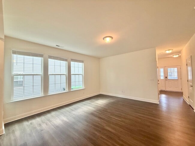 Building Photo - Spacious 3BD, 2.5BA End Unit Raleigh Townhome Near White Oak Shopping Center, I-40, and Downtown ...
