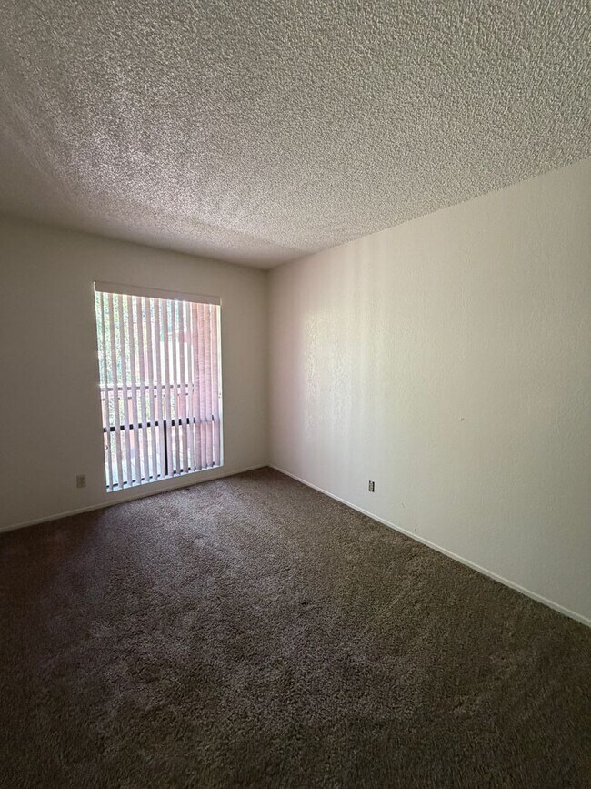 Building Photo - Spacious 2 Bed, 1.5 Bath Condo w/Carport - Outdoor Pool in Summer (Long Term Rental)