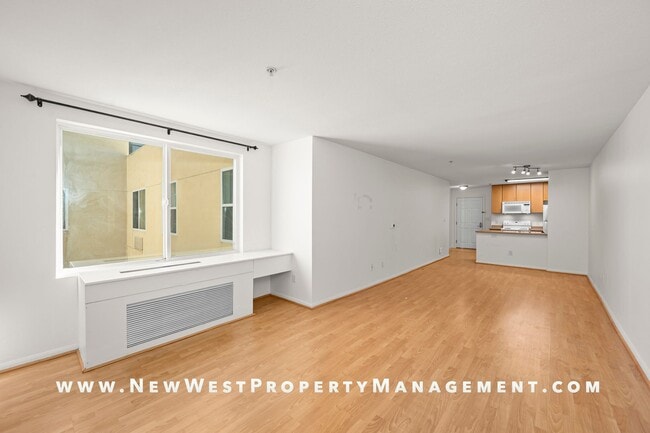 Building Photo - Charming Little Italy 1-Bedroom at Portico! Small Pet OK! Available Now!