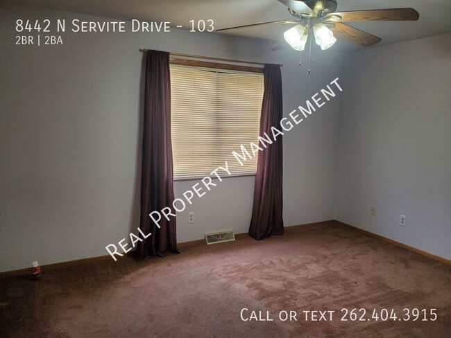 Building Photo - 8442 N Servite Dr