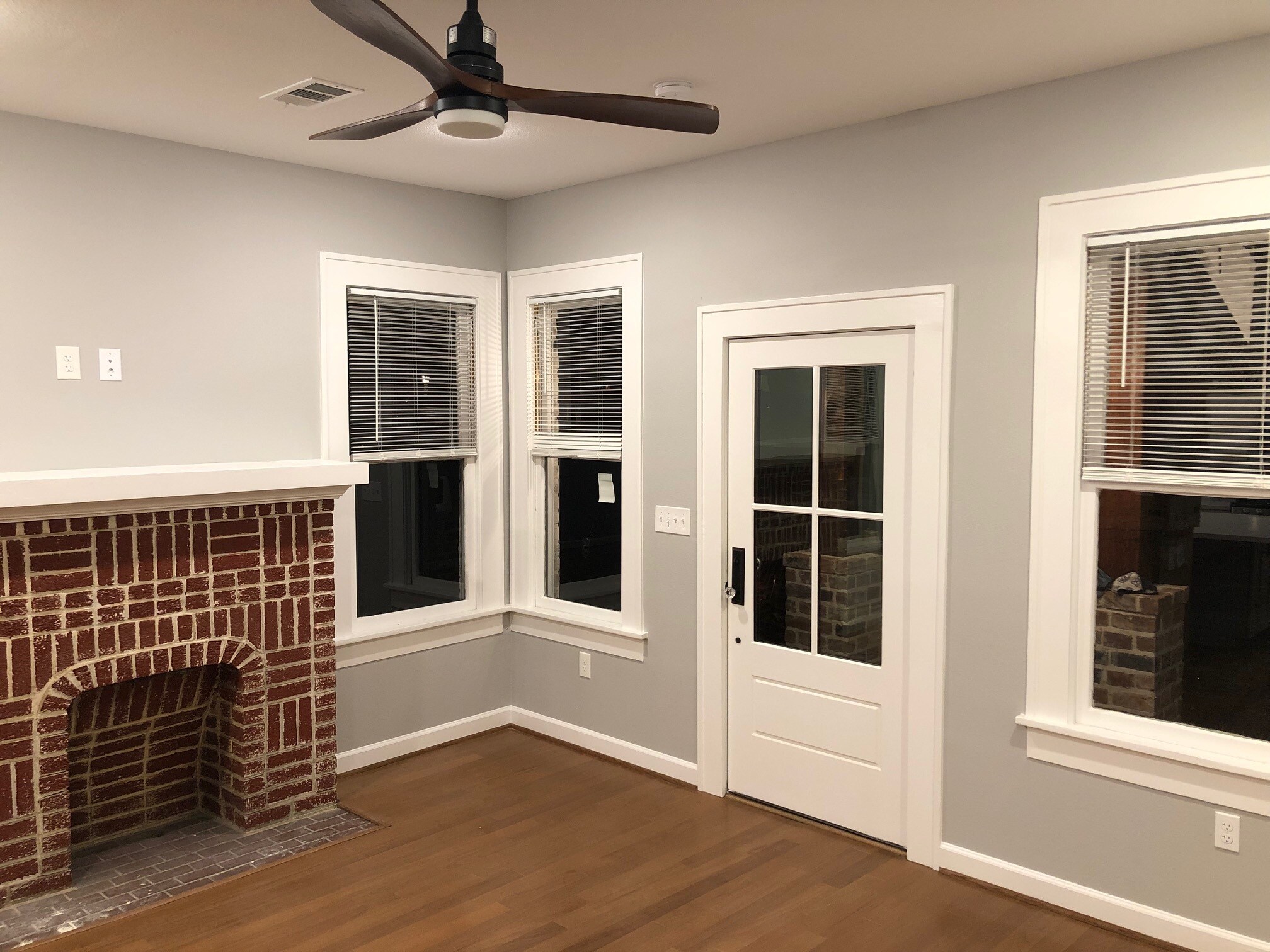 view of front door and fireplace - 1742 W Main St