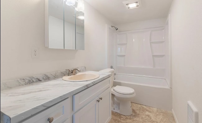 Building Photo - Three bedroom two bath home in a quiet nei...