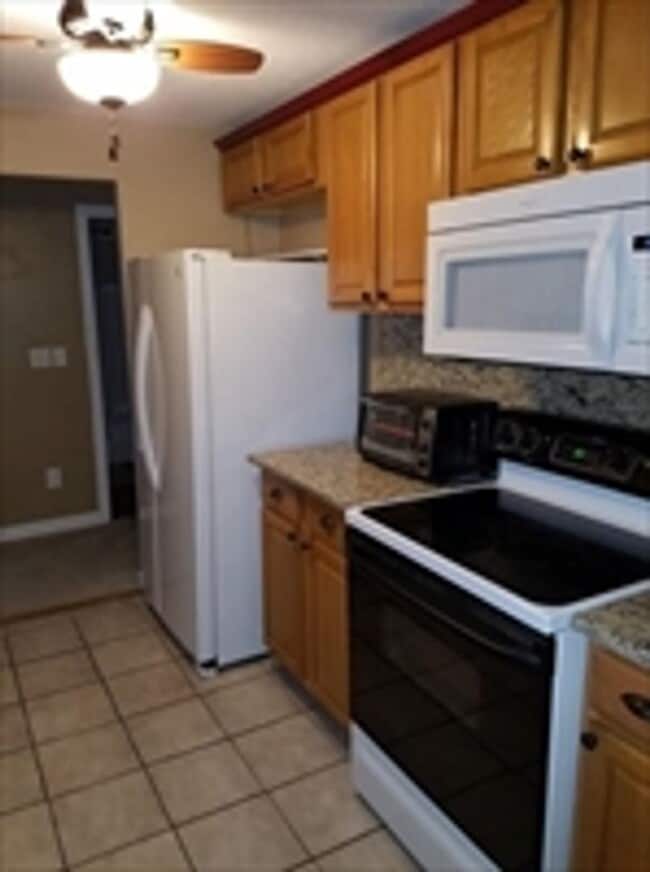 Building Photo - Modern Comfort Meets Convenience in This Stylish Franklin Condo