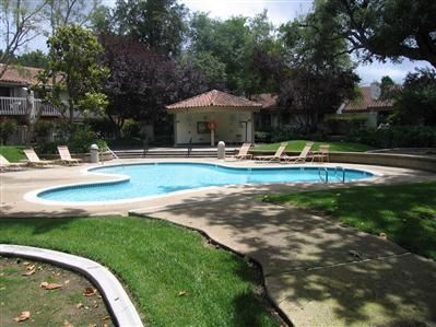 Pool outside of back patio of townhome - 673 Arroyo Oaks Dr