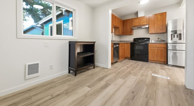 Building Photo - Bright Rambler in Quiet, Convenient Neighborhood