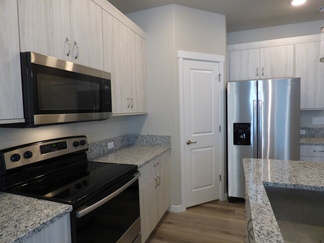 Building Photo - Maintenance Free, Brand New Construction
