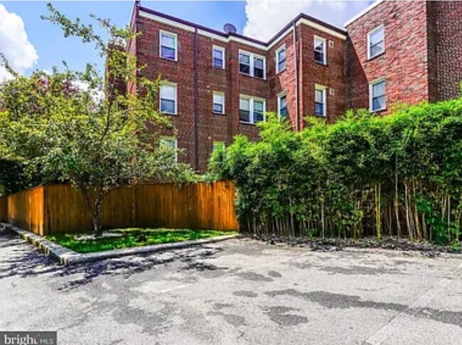 Assigned parking spot in gated parking lot - 1384 Bryant St NE