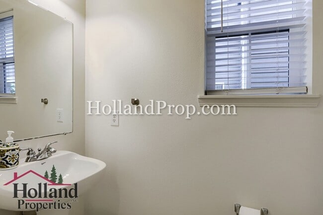 Building Photo - Charming 3-Bedroom Home with Wood Floors, Gas Fireplace & Private Patio