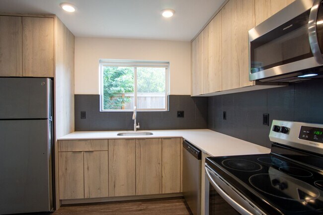 Building Photo - Stylish + Modern Corner 2-Bedroom Townhouse!