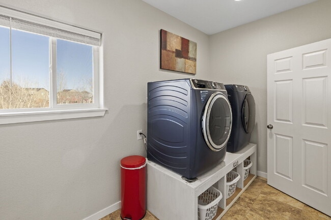 Building Photo - Spacious Home with Finished Basement, Granite Kitchen & Fenced Yard Near Fort Carson