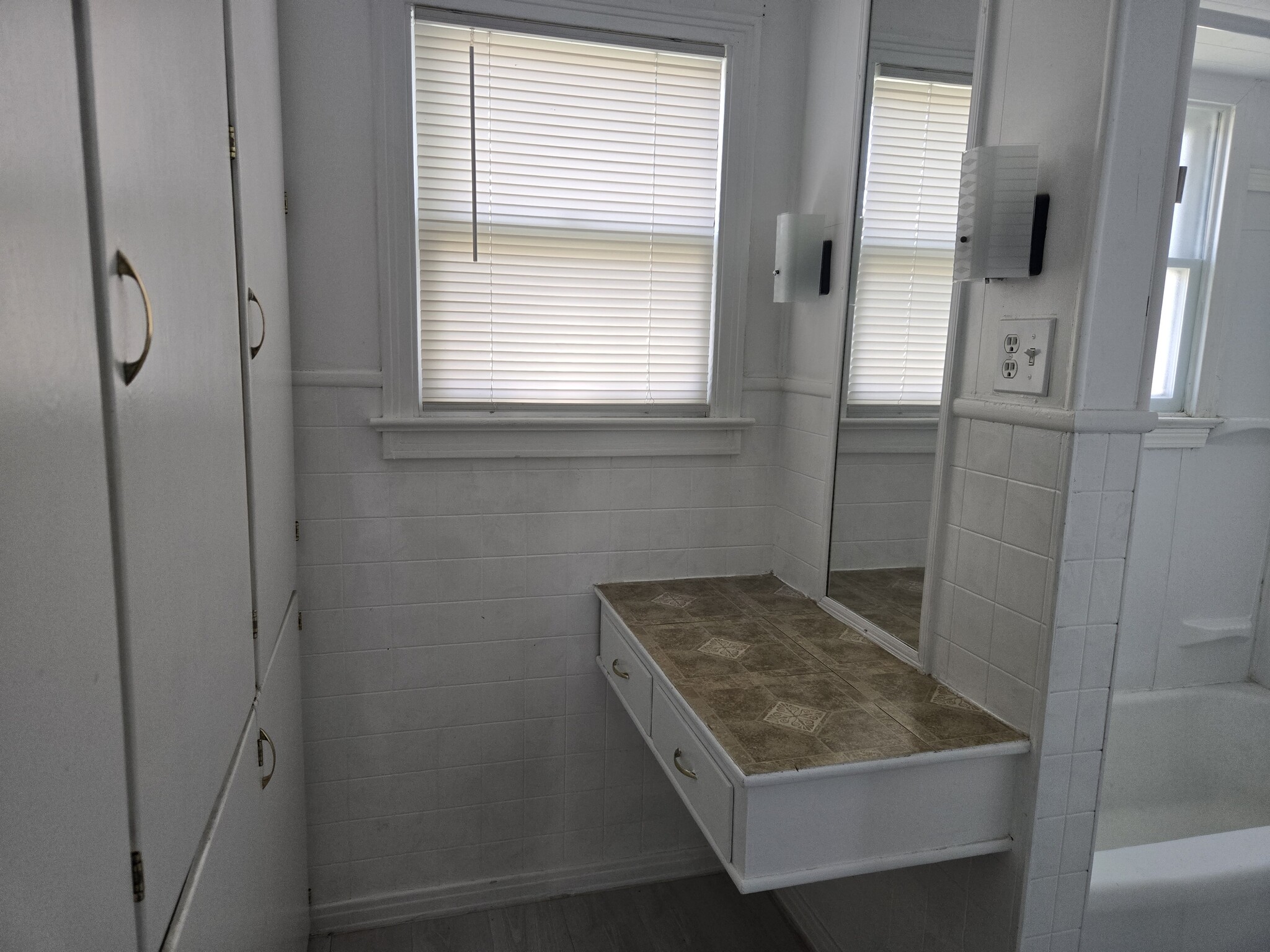 Custom built vanity with lights and mirror - 2863 Colorado Ave