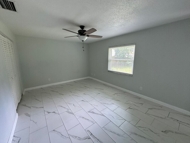 Building Photo - Fully remodeled 3/2 home for rent in the heart of Port Orange
