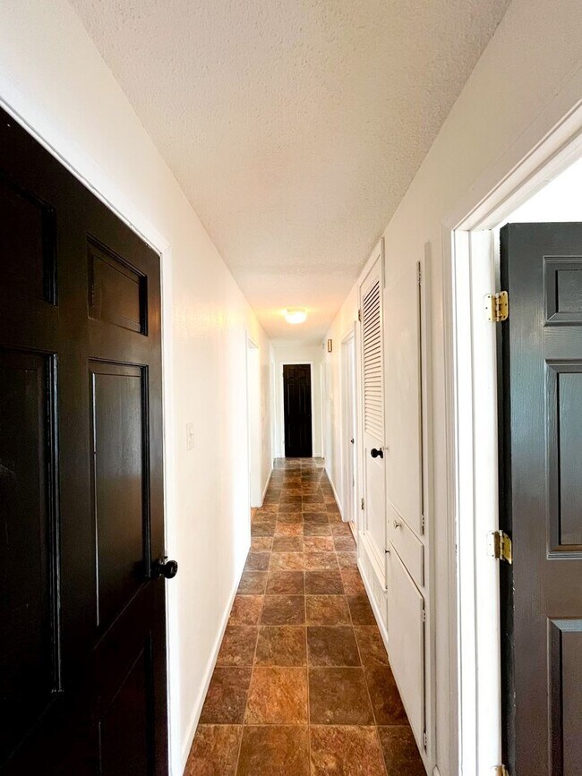 Building Photo - Available Now!!!! Gorgeous 3 bedroom, 2 bath, 2 car garage home. Beautiful wood look flooring. Sp...
