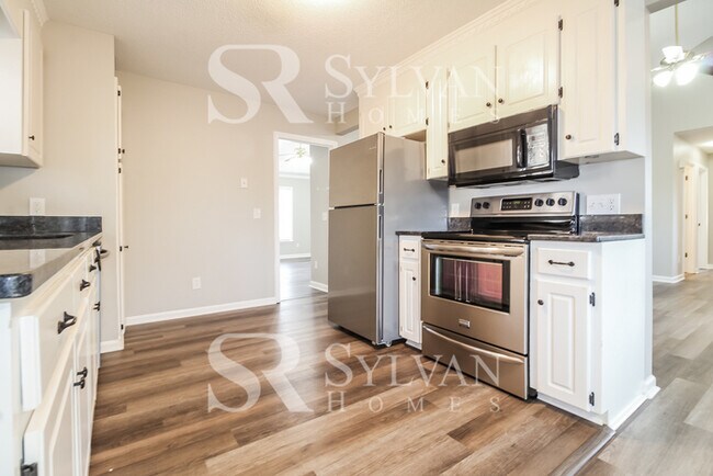 Building Photo - This lovely home is ready for your personal touch!