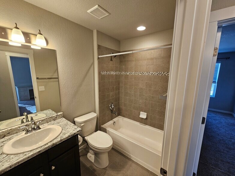 Building Photo - 8127 Burl Wood Dr