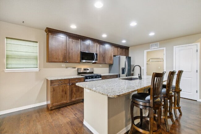 Building Photo - Stylish Cordera Ranch with Finished Basement, Gourmet Kitchen, and Ideal D20 Location