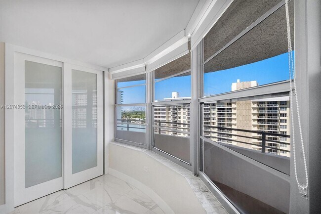 Building Photo - 5555 Collins Ave