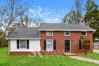 Building Photo - You'll love this charming brick home!
