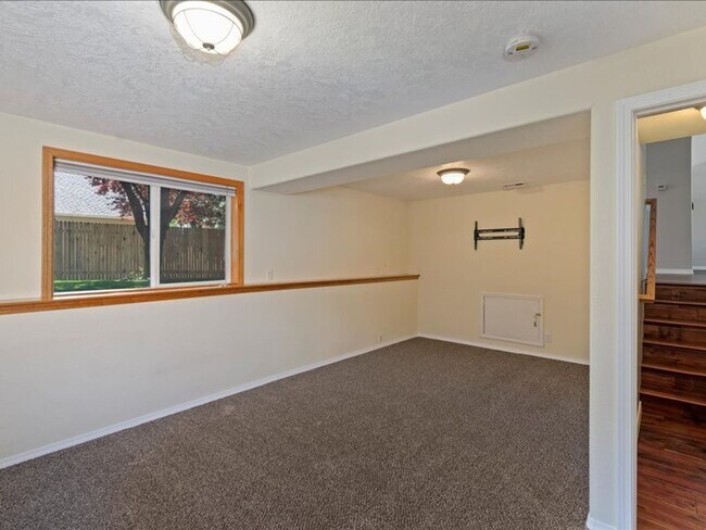 Building Photo - June Rent Free!!  Move Today!  Four Bedroom, Three Bath Home with Beautiful Backyard, Two Car Gar...