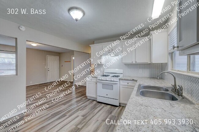 Building Photo - 302 W. Bass-