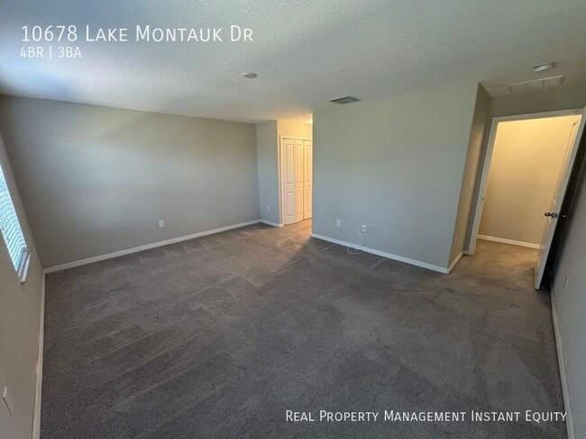 Building Photo - 10678 Lake Montauk Dr